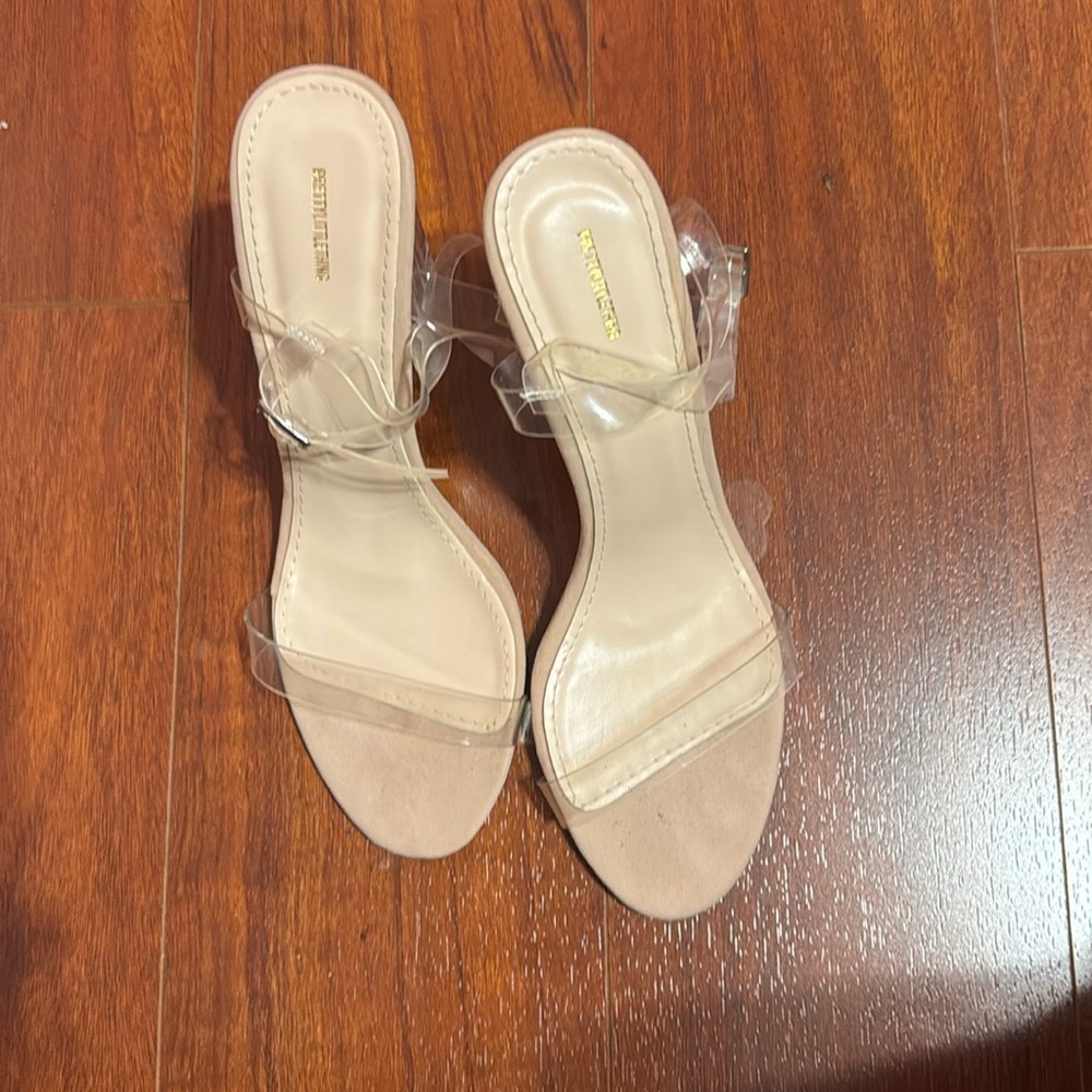 Clear heels only worn once .